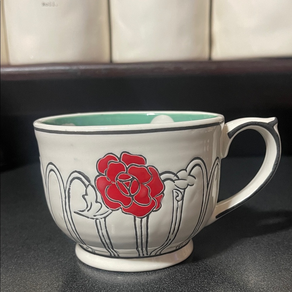 Molly Hatch Floral Ceramic Mug with Red and Green Accents Anthropologie